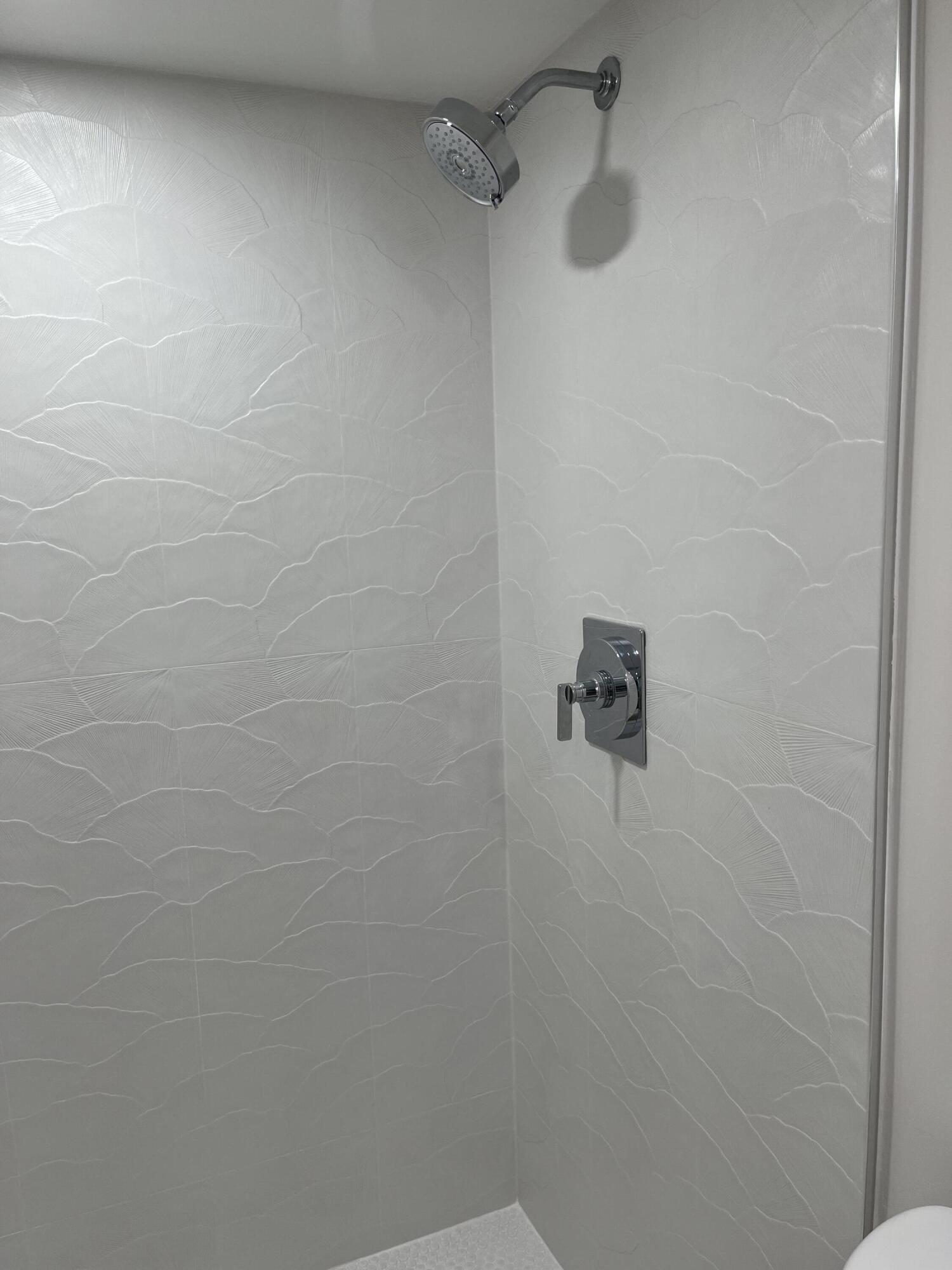 6562 Boca Del Mar Drive, Unit 222 Boca Raton, FL 33433 - Photo 18 of 39 a bathroom with a shower