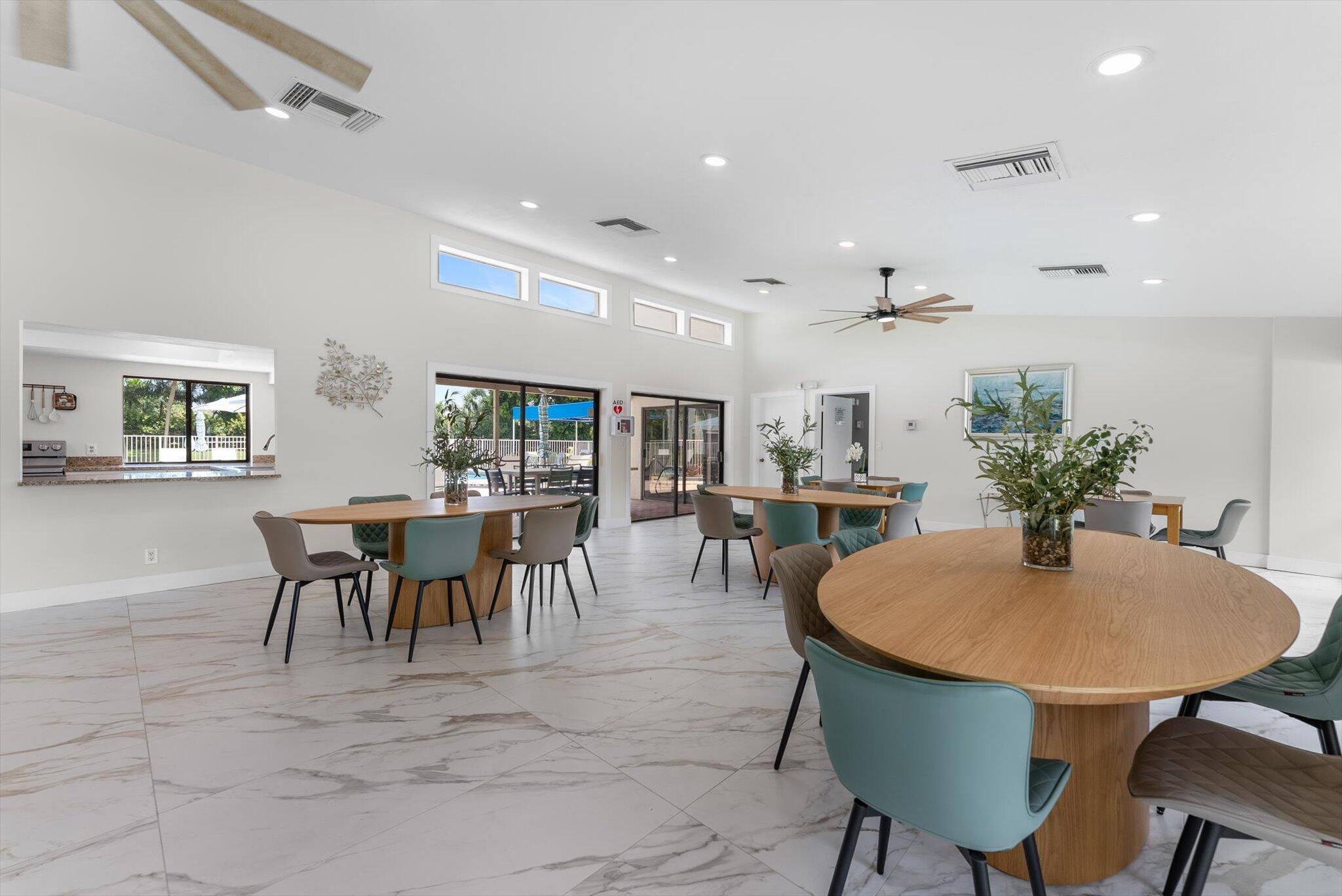 6562 Boca Del Mar Drive, Unit 222 Boca Raton, FL 33433 - Photo 26 of 39 a dining room with furniture and a livingroom