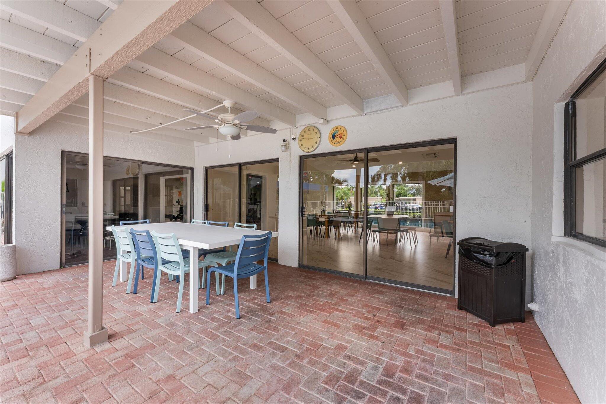 6562 Boca Del Mar Drive, Unit 222 Boca Raton, FL 33433 - Photo 32 of 39 a dining room with furniture and window