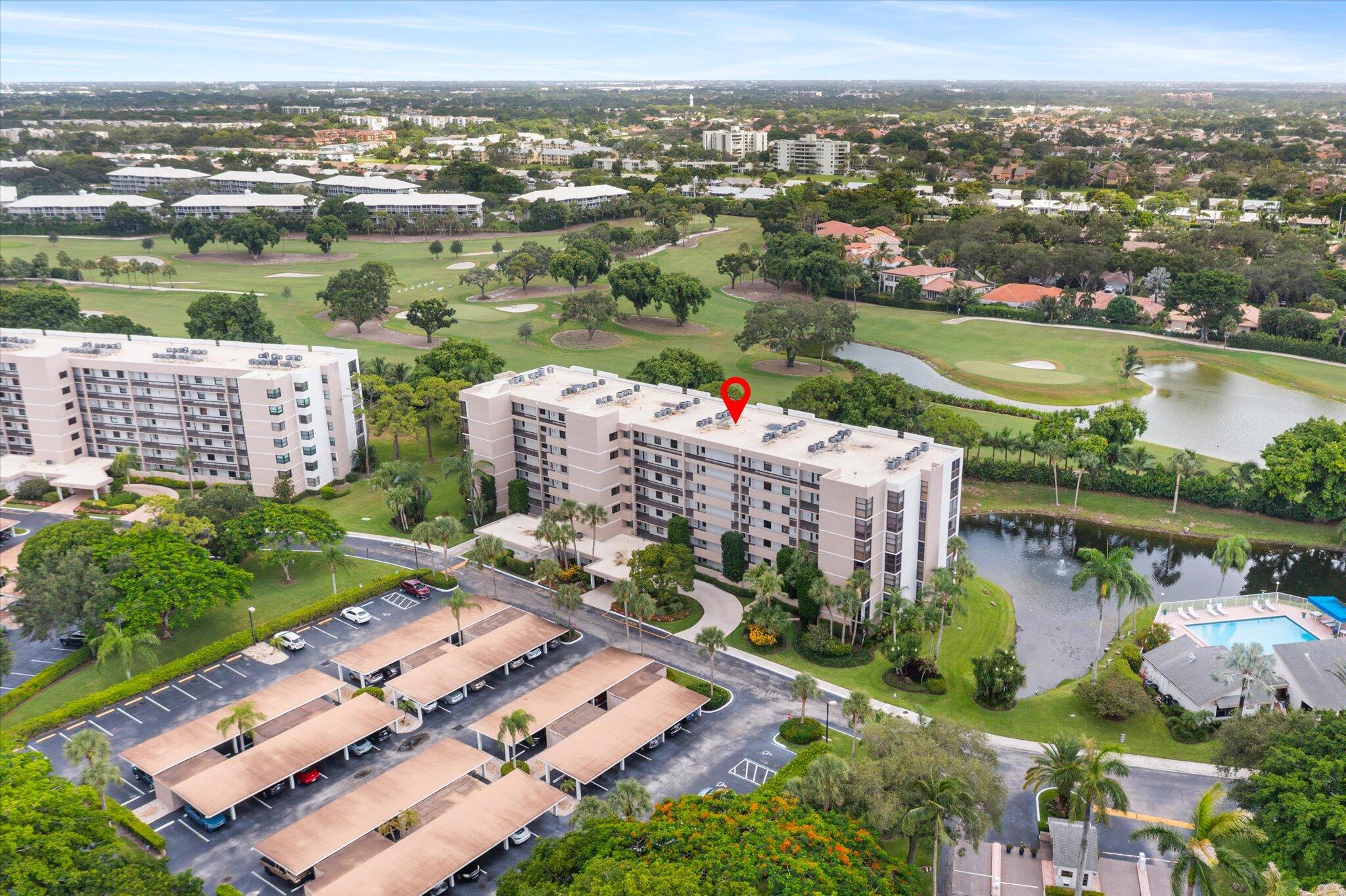6562 Boca Del Mar Drive, Unit 222 Boca Raton, FL 33433 - Photo 35 of 39 an aerial view of a city with swimming pool and ocean view