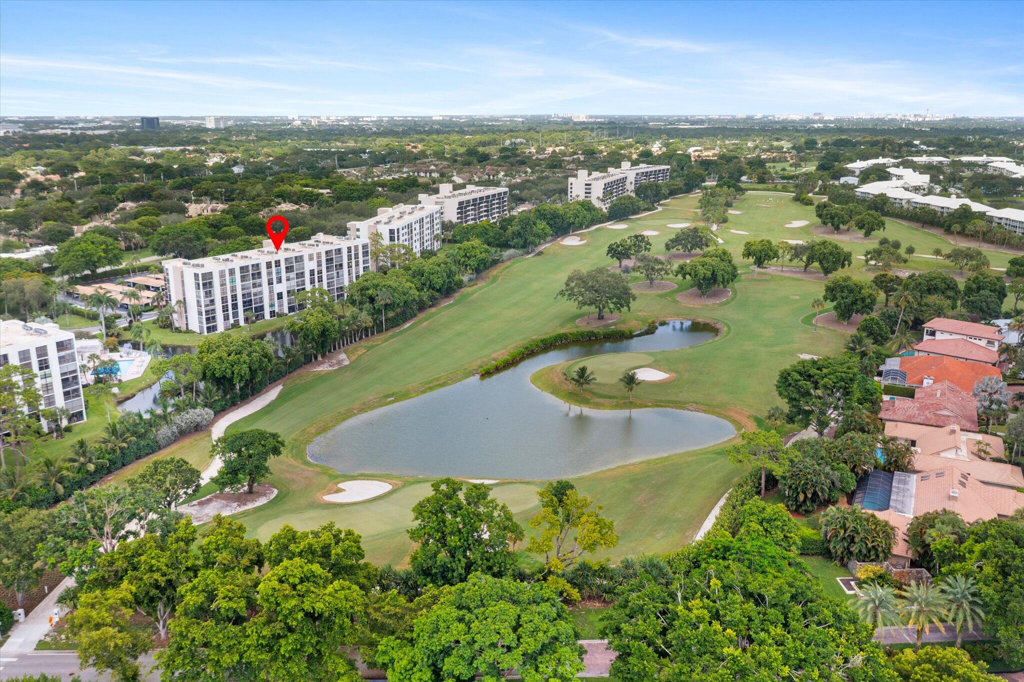 6562 Boca Del Mar Drive, Unit 222 Boca Raton, FL 33433 - Photo 4 of 39 an aerial view of residential houses with outdoor space and ocean view