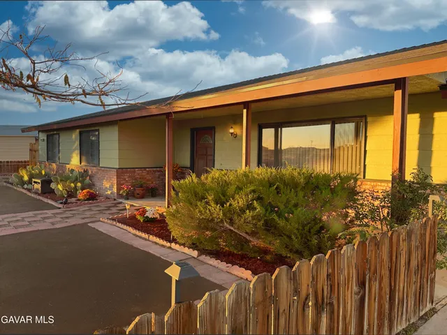 a front view of a house having patio