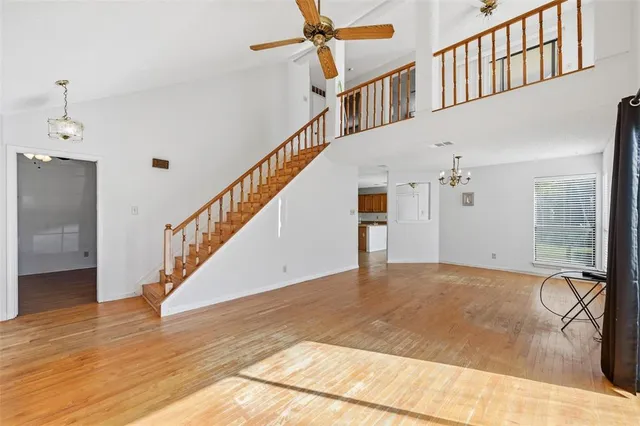 a view of a hallway with staircase