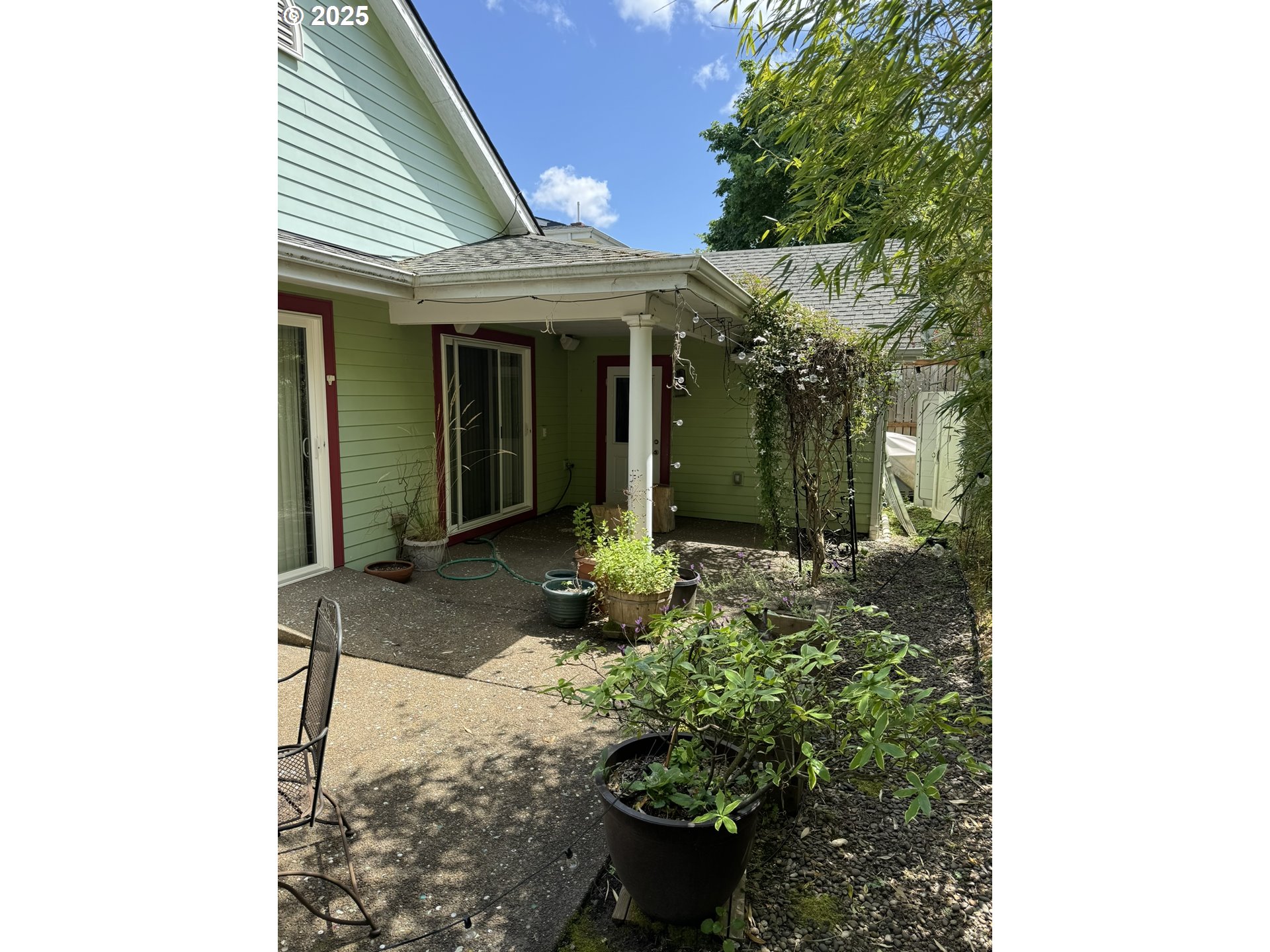 810 East 20th Avenue Eugene, OR 97405 - Photo 29 of 30 a view of a house with potted plants