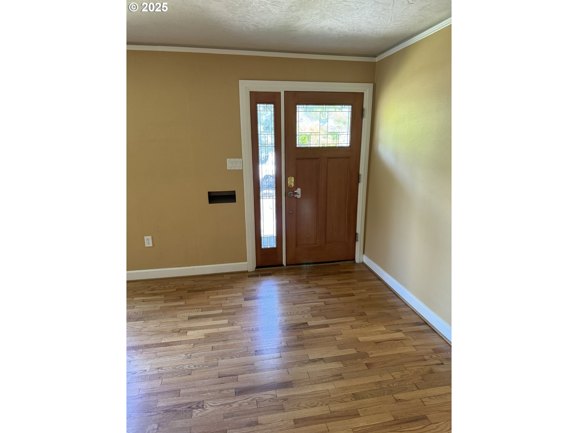 810 East 20th Avenue Eugene, OR 97405 - Photo 4 of 30 a view of an empty room with wooden floor