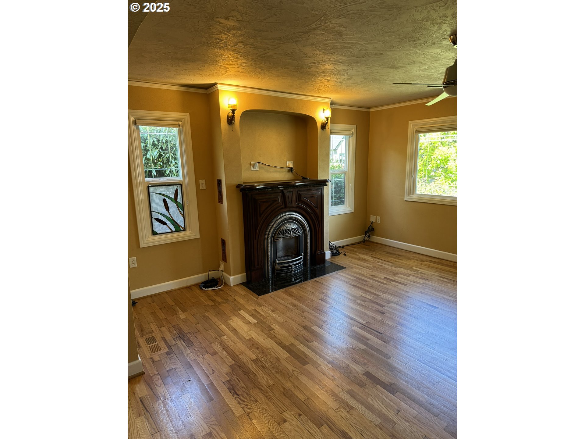 810 East 20th Avenue Eugene, OR 97405 - Photo 5 of 30 a view of a livingroom with wooden floor and a window