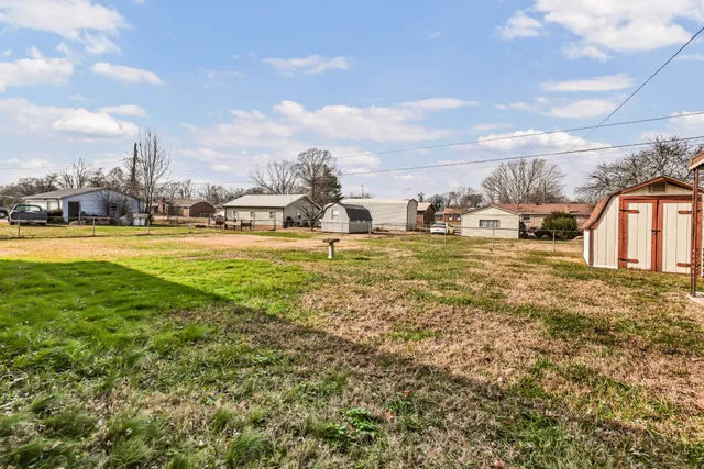 a view of a ocean with a big yard