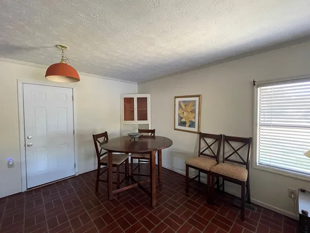 a view of a livingroom and dining room