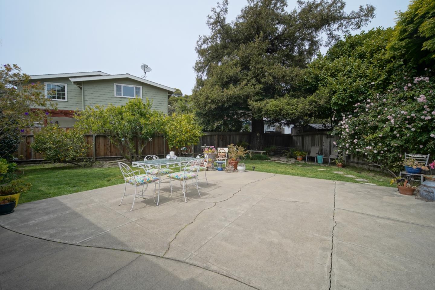 3445 Rio Road Carmel, CA 93923 - Photo 11 of 16 a view of a house with backyard and sitting area