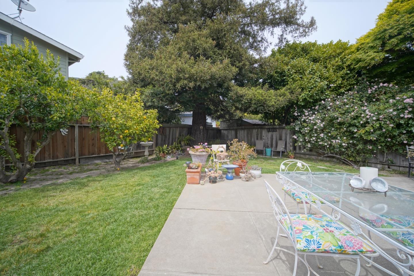 3445 Rio Road Carmel, CA 93923 - Photo 12 of 16 a view of a backyard with sitting area