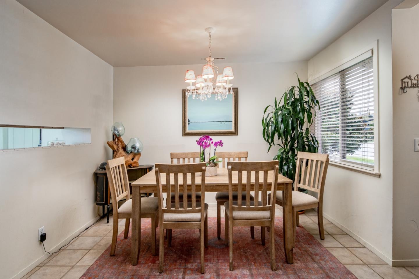 3445 Rio Road Carmel, CA 93923 - Photo 6 of 16 a view of a dining room with furniture and window
