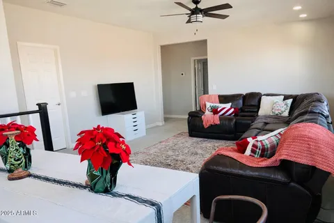 a bathroom with kitchen island a sink and a mirror
