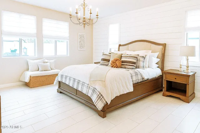 a bedroom with a bed and a cabinets