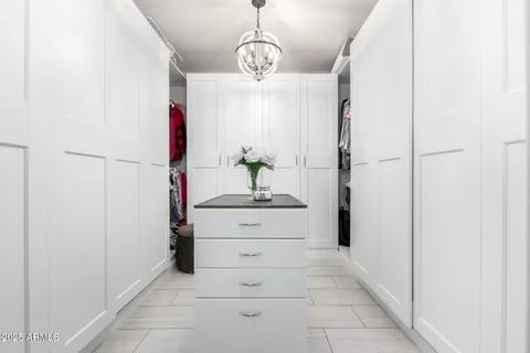 a view of a house with backyard porch and sitting area