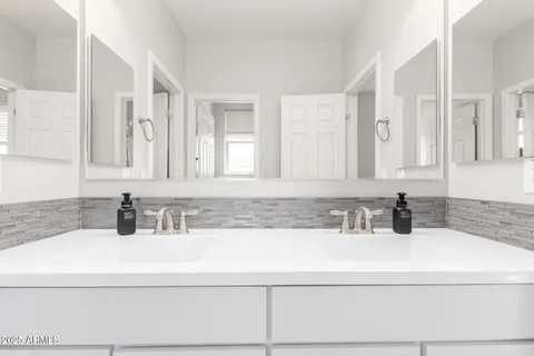 a view of a kitchen with kitchen island