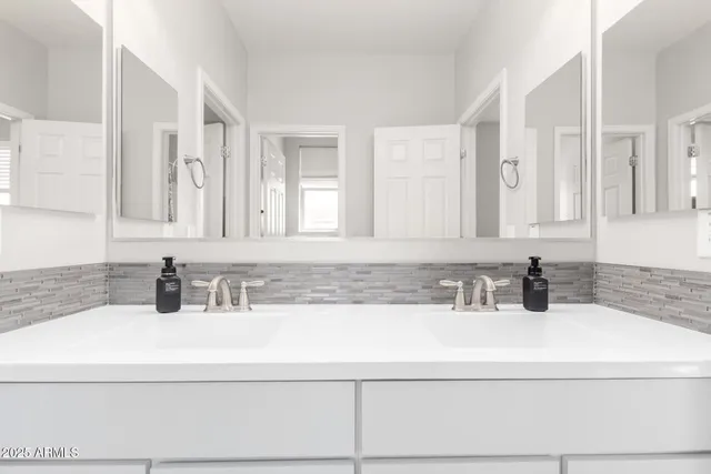 a view of a kitchen with kitchen island