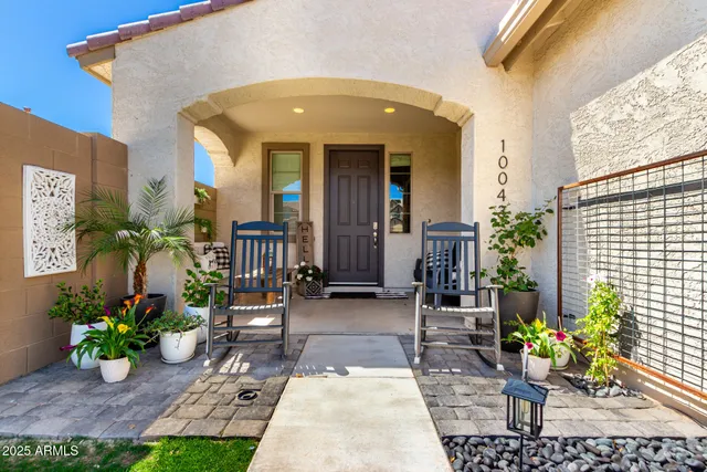 a living room with furniture fireplace and flat screen tv