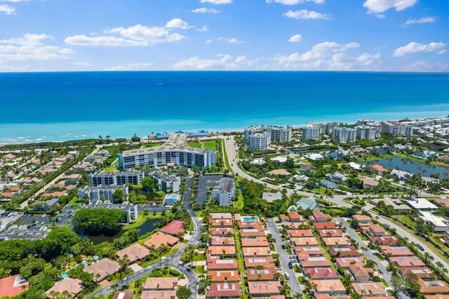 a view of city with ocean