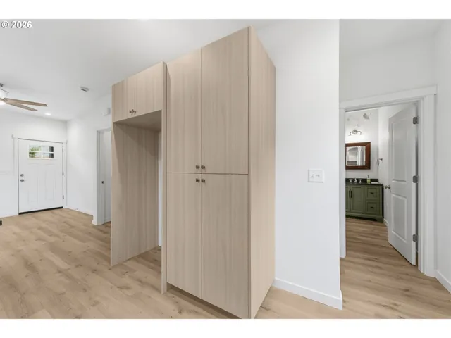 a view of a kitchen from the hallway
