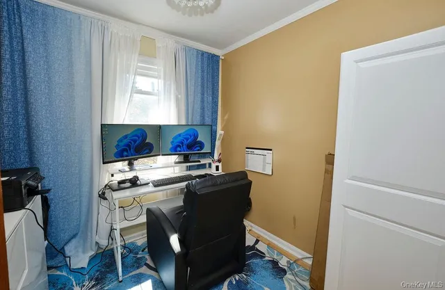 a room with a chair and appliances