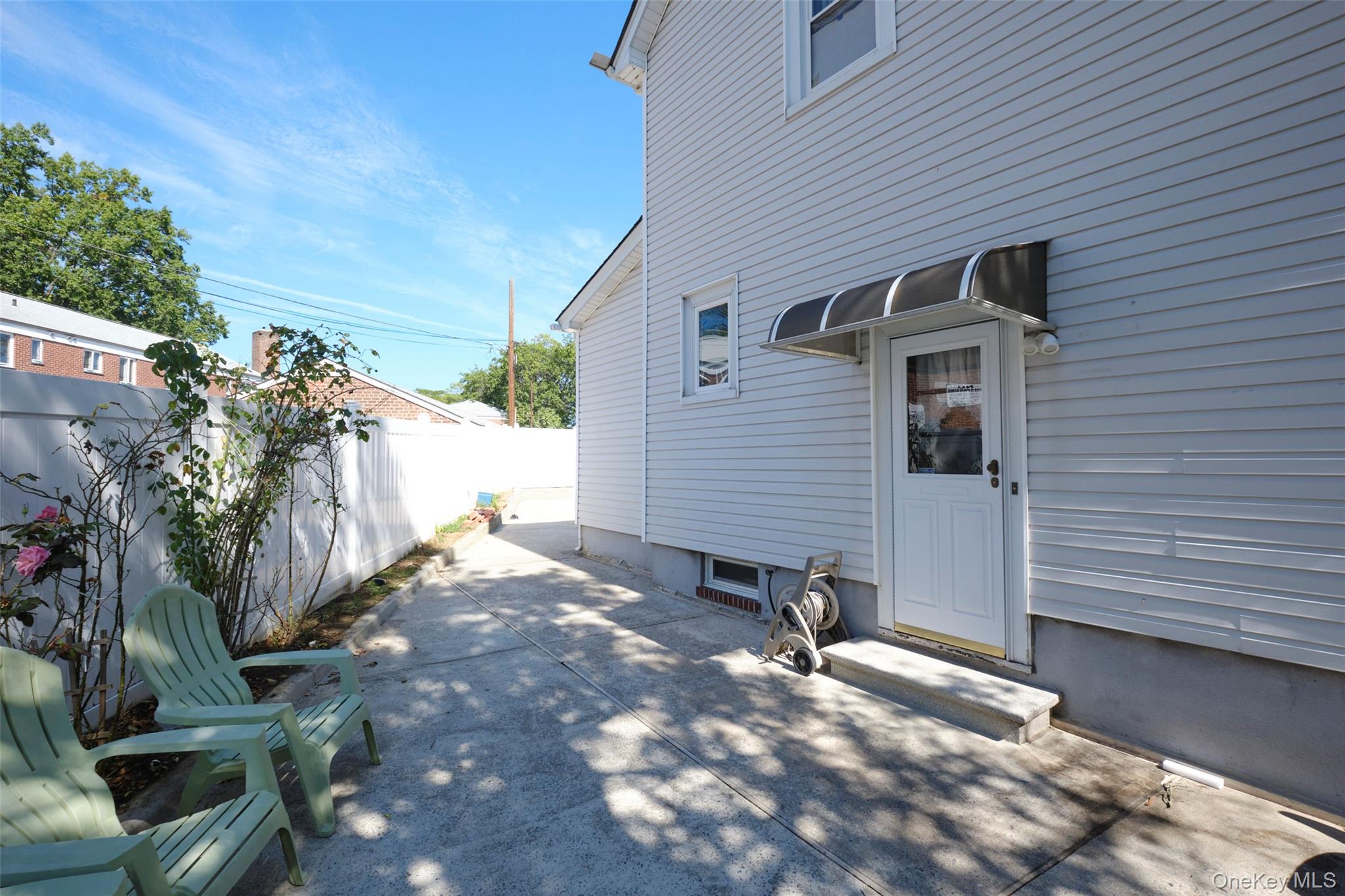 230-09 87th Avenue Queens, NY 11427 - Photo 20 of 22 a view of backyard of house