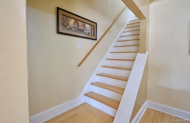 a view of entryway with wooden floor