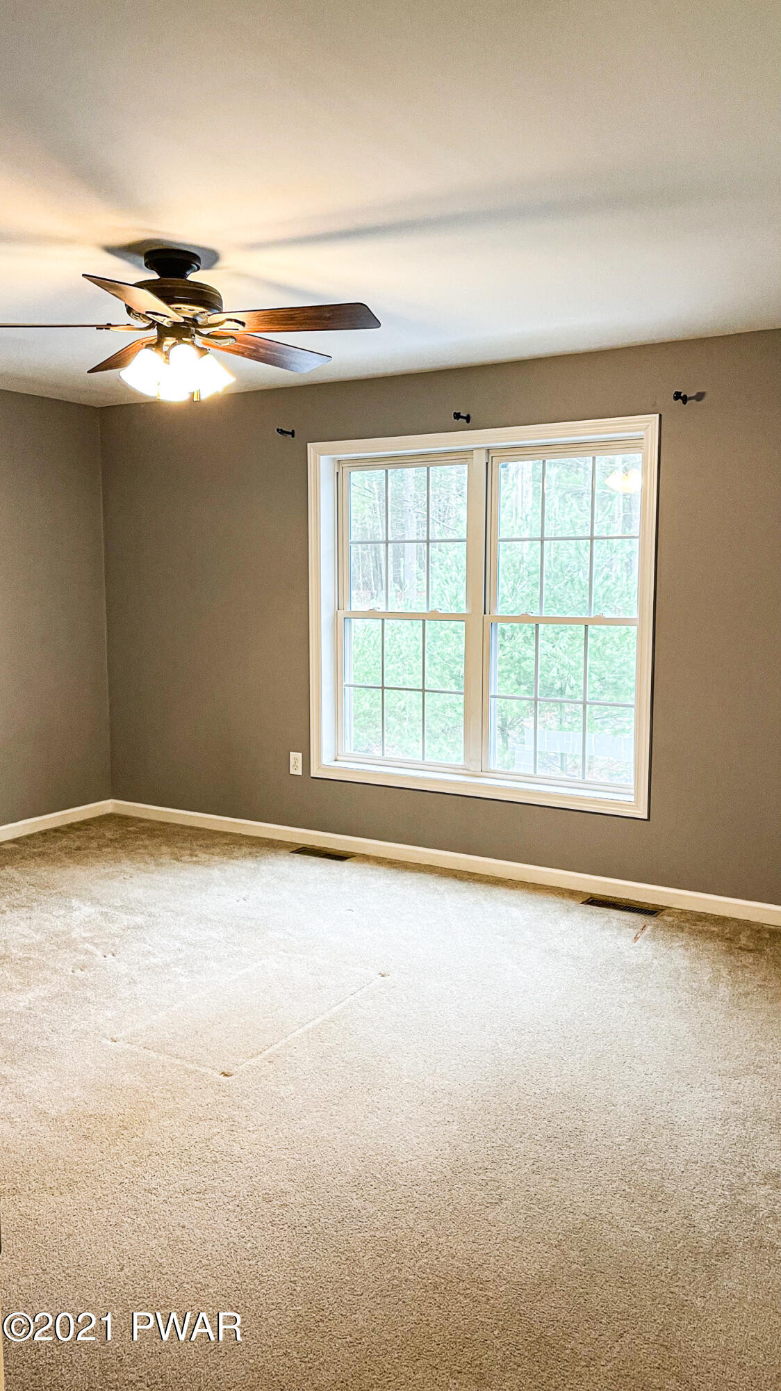 159 Fox Road Dingmans Ferry, PA 18328 - Photo 31 of 80 an empty room with windows
