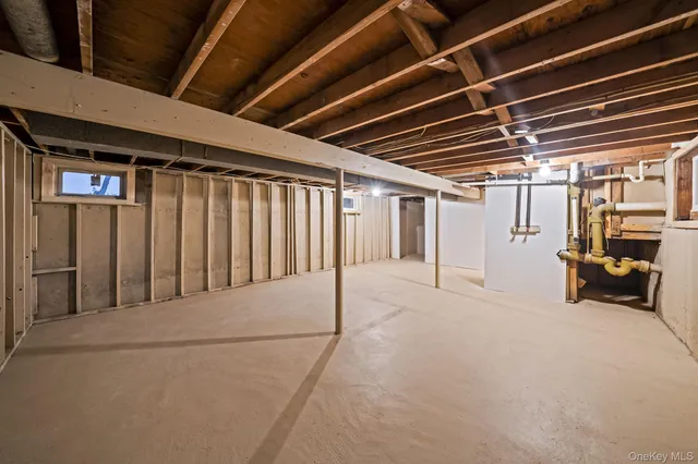 a view of a room with wooden walls