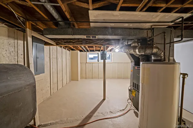 a view of an empty room with a large window