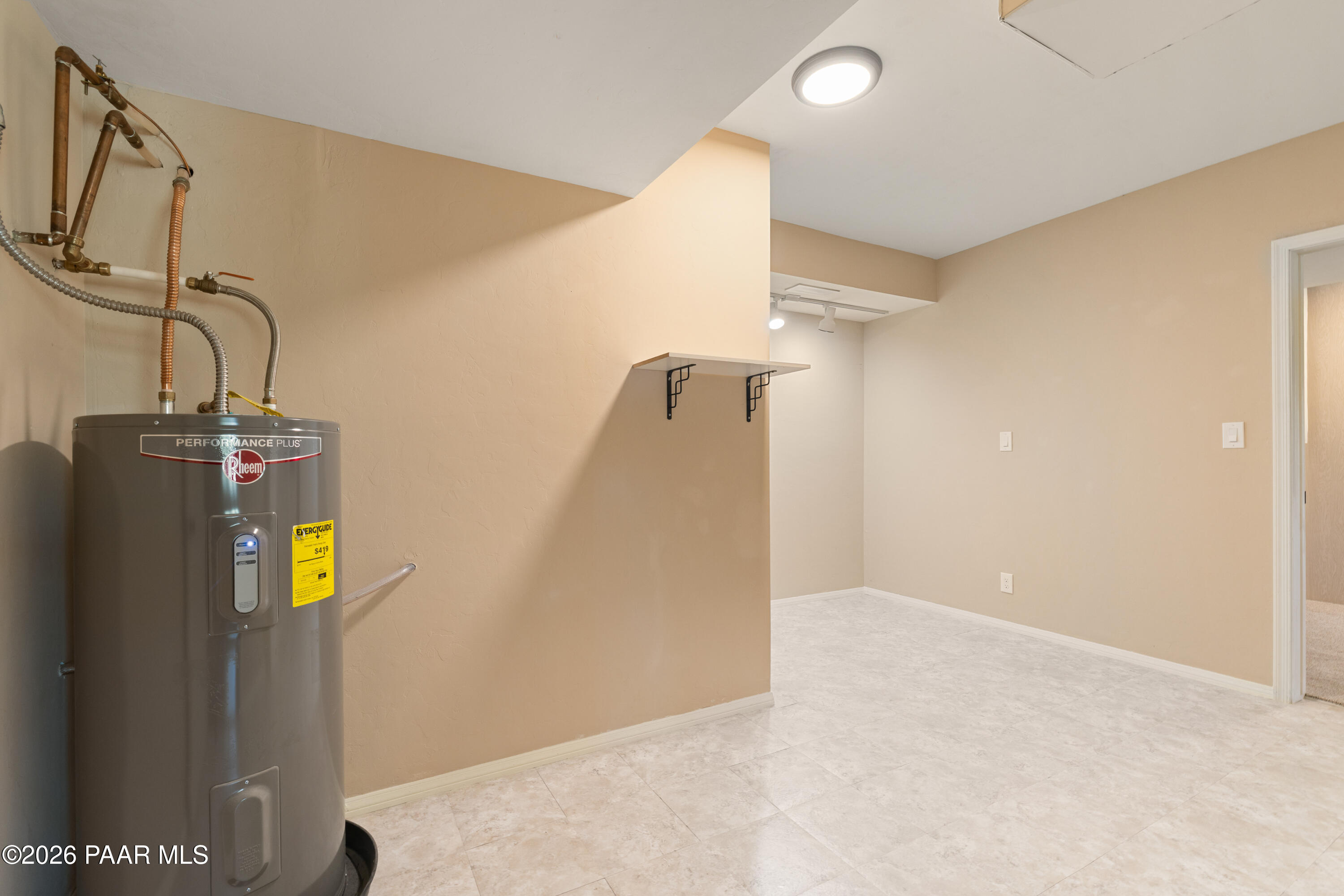 1289 Manzanita Hill Road Prescott, AZ 86303 - Photo 37 of 64 Lower Level Storage-Workout Room-Office