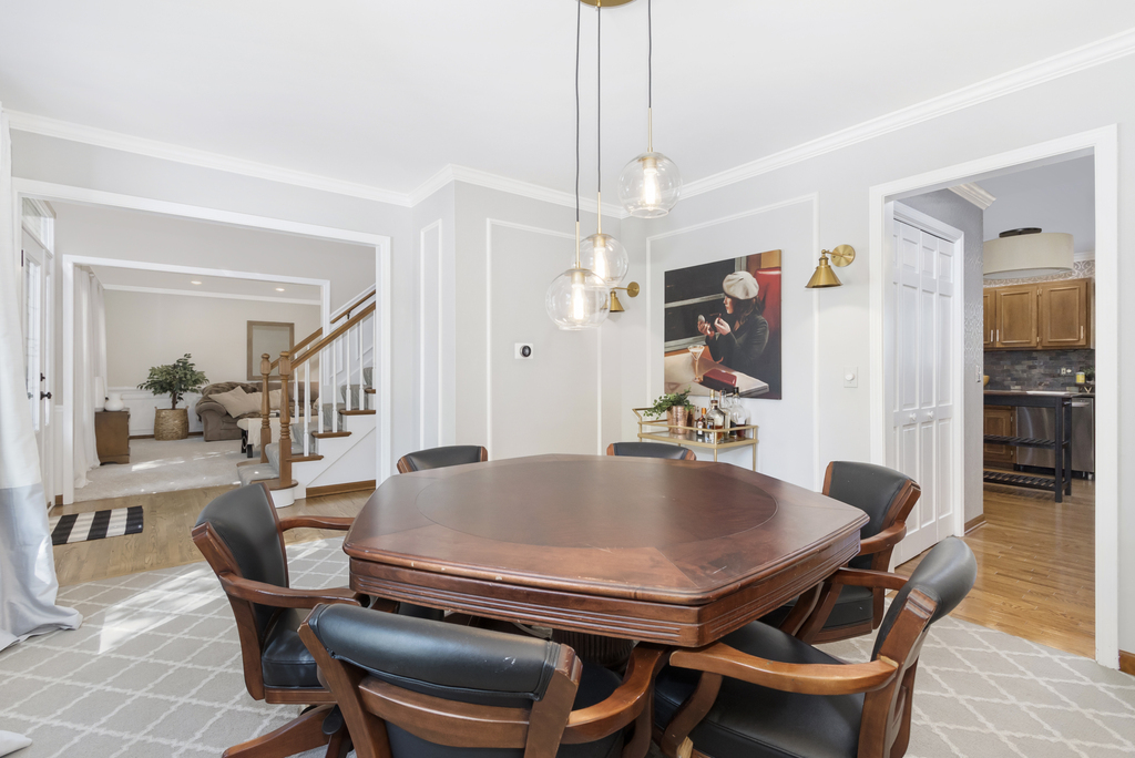 1712 Mundelein Road Naperville, IL 60565 - Photo 14 of 42 a dining room with furniture and window