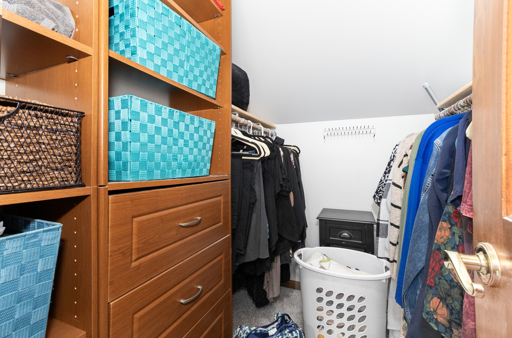 1712 Mundelein Road Naperville, IL 60565 - Photo 24 of 42 a bathroom with a toilet a sink and a shower curtain