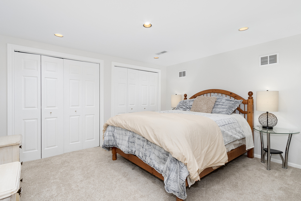 1712 Mundelein Road Naperville, IL 60565 - Photo 30 of 42 a bedroom with a bed and a window