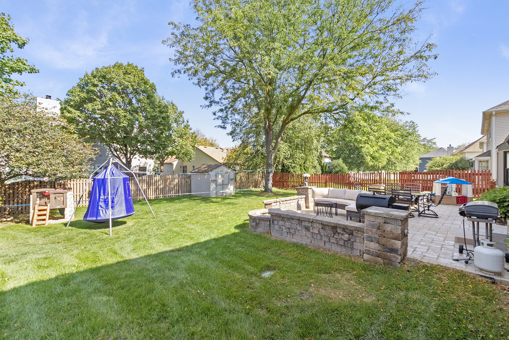 1712 Mundelein Road Naperville, IL 60565 - Photo 36 of 42 a view of a backyard with sitting area