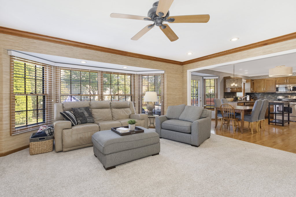 1712 Mundelein Road Naperville, IL 60565 - Photo 8 of 42 a living room with furniture and a large window