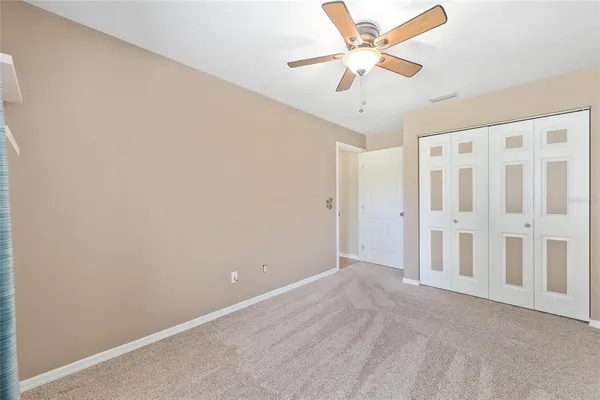 a view of a water heater room with a garage