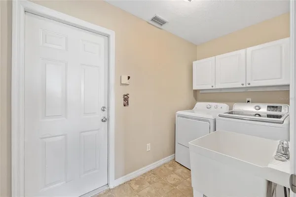 a view of a lake with a building in the background