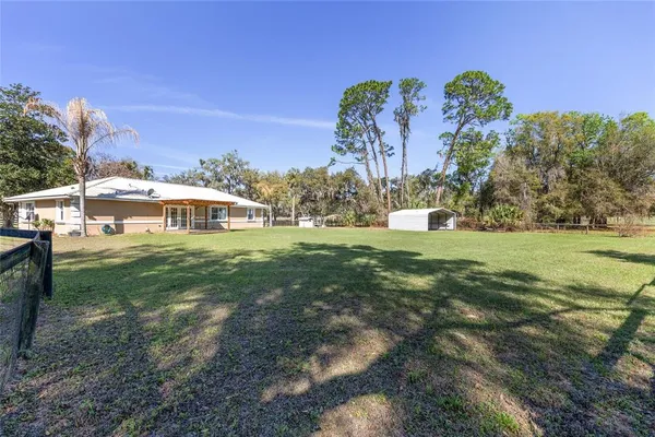 $450,000 | 205 East Highway 318, Citra, FL 32113