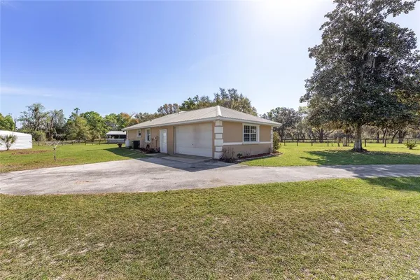 $450,000 | 205 East Highway 318, Citra, FL 32113