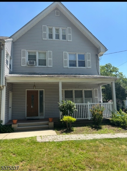 134 Tingley Lane Edison, NJ 08820 - Photo 1 of 10 a front view of a house with a yard
