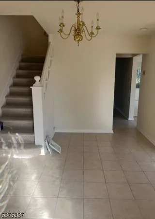 a view of a room with stairs