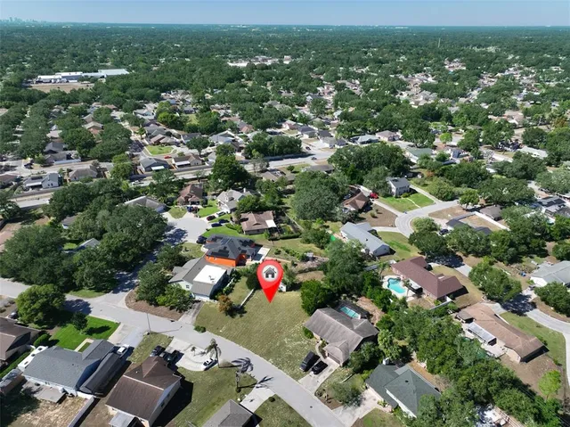 an aerial view of a city with lots of residential buildings