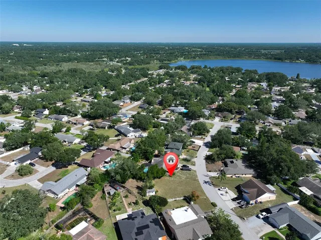 an aerial view of a city with lots of residential buildings