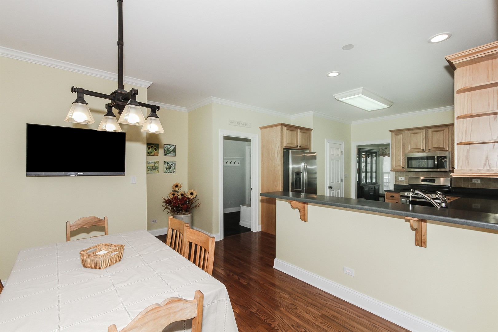 8762 Country Shire Lane Spring Grove, IL 60081 - Photo 13 of 39 a very nice looking living room with a flat screen tv