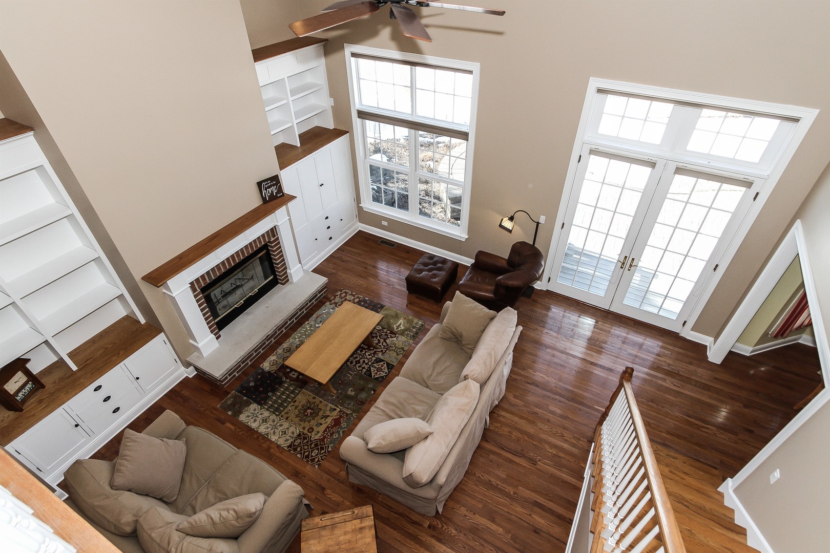 8762 Country Shire Lane Spring Grove, IL 60081 - Photo 14 of 39 a living room with furniture and a fireplace