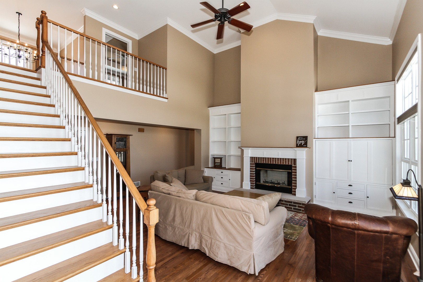 8762 Country Shire Lane Spring Grove, IL 60081 - Photo 15 of 39 a living room with furniture and a fireplace