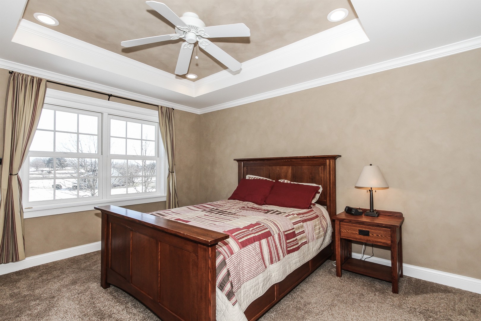 8762 Country Shire Lane Spring Grove, IL 60081 - Photo 18 of 39 a bedroom with a bed and a window