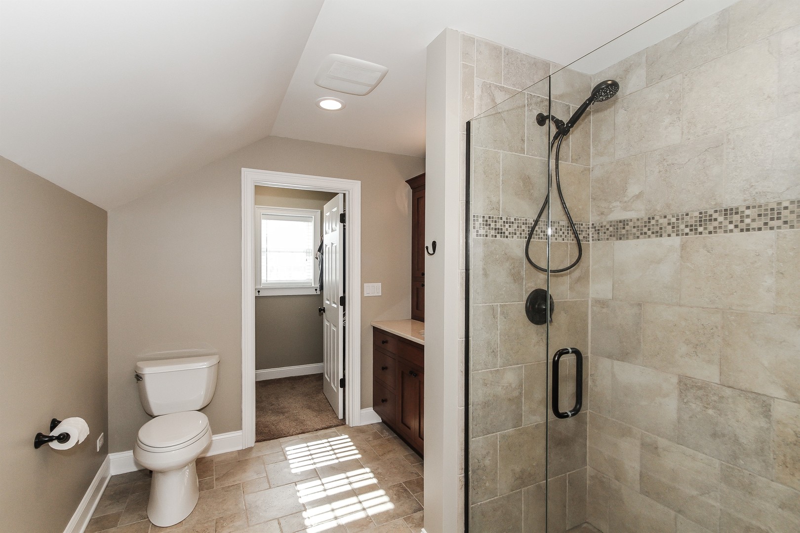 8762 Country Shire Lane Spring Grove, IL 60081 - Photo 20 of 39 a bathroom with a granite countertop shower and a toilet