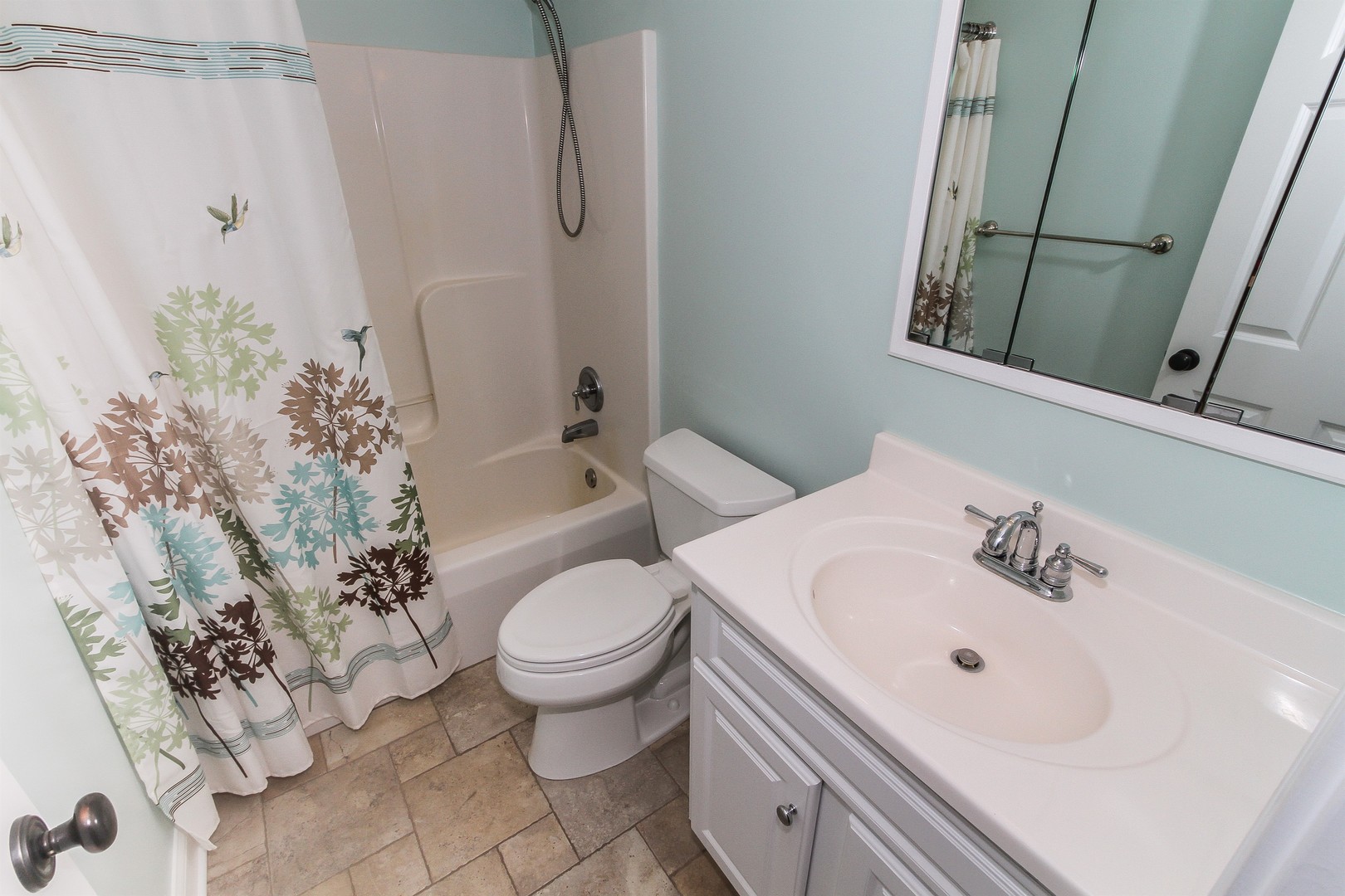 8762 Country Shire Lane Spring Grove, IL 60081 - Photo 25 of 39 a bathroom with a sink toilet and shower