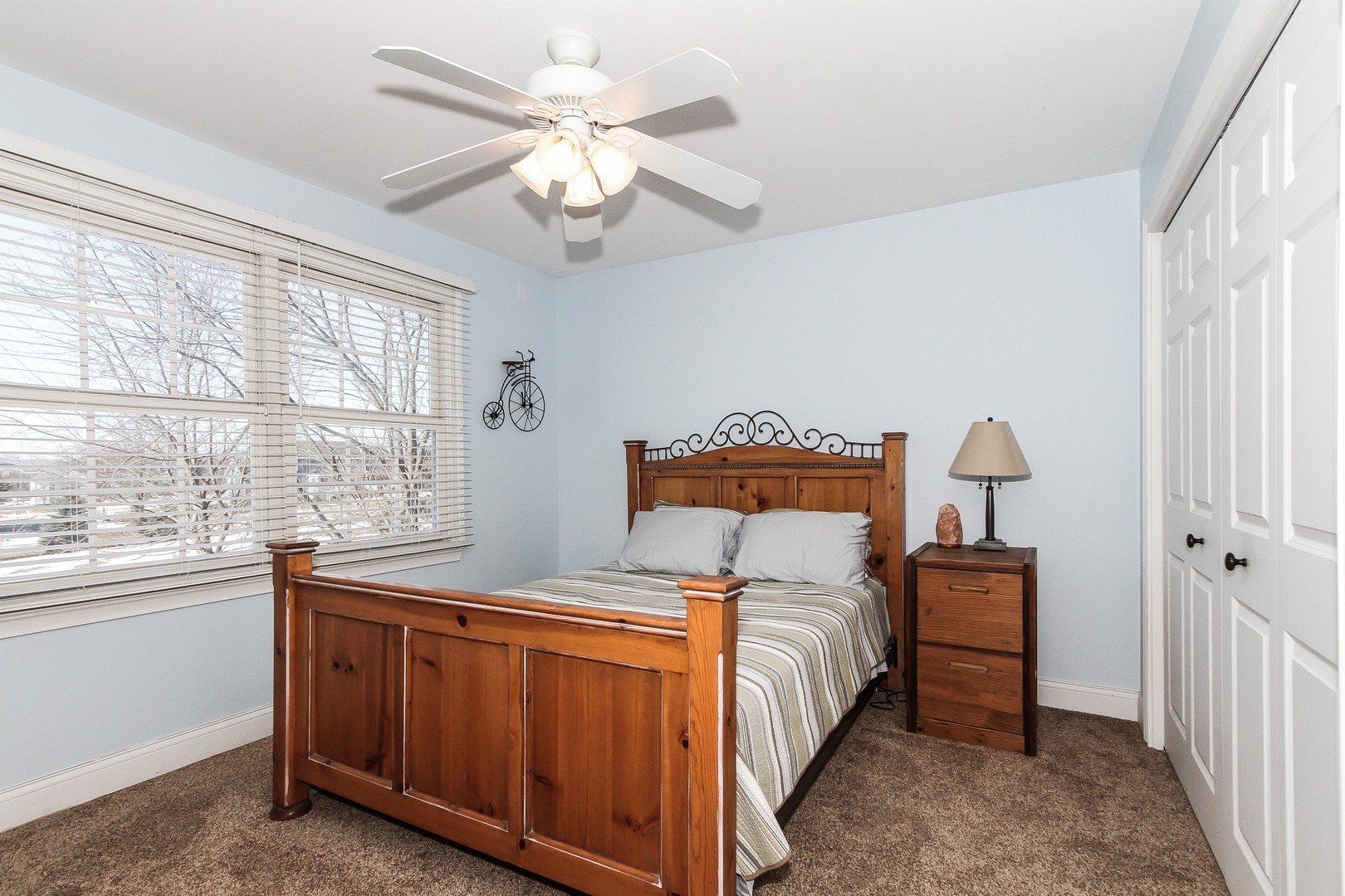 8762 Country Shire Lane Spring Grove, IL 60081 - Photo 26 of 39 a bedroom with a bed and a window